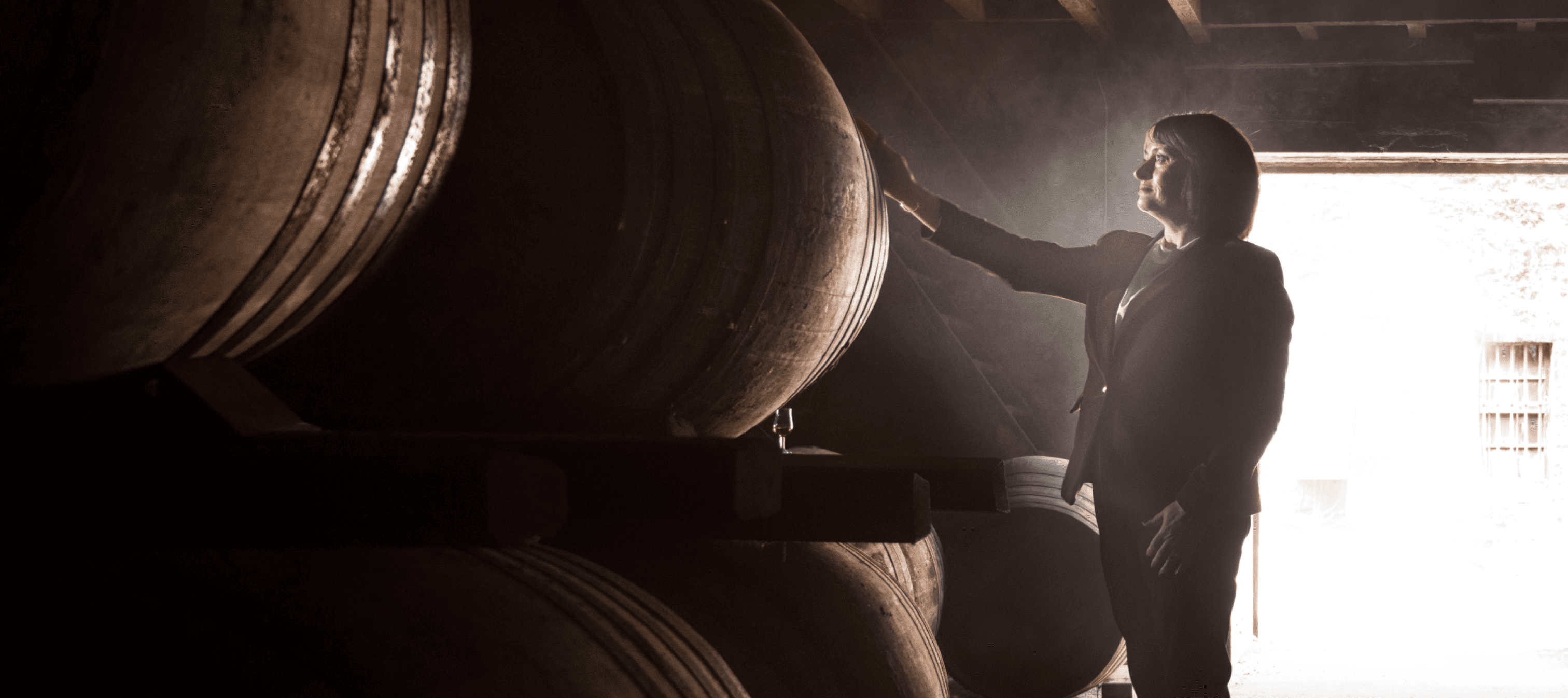 Dr. Rachel Barrie inspects casks